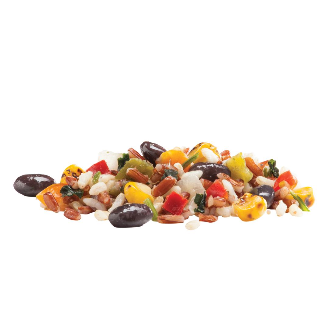 Granos exóticos y combinación de verduras rostizadas a la llama