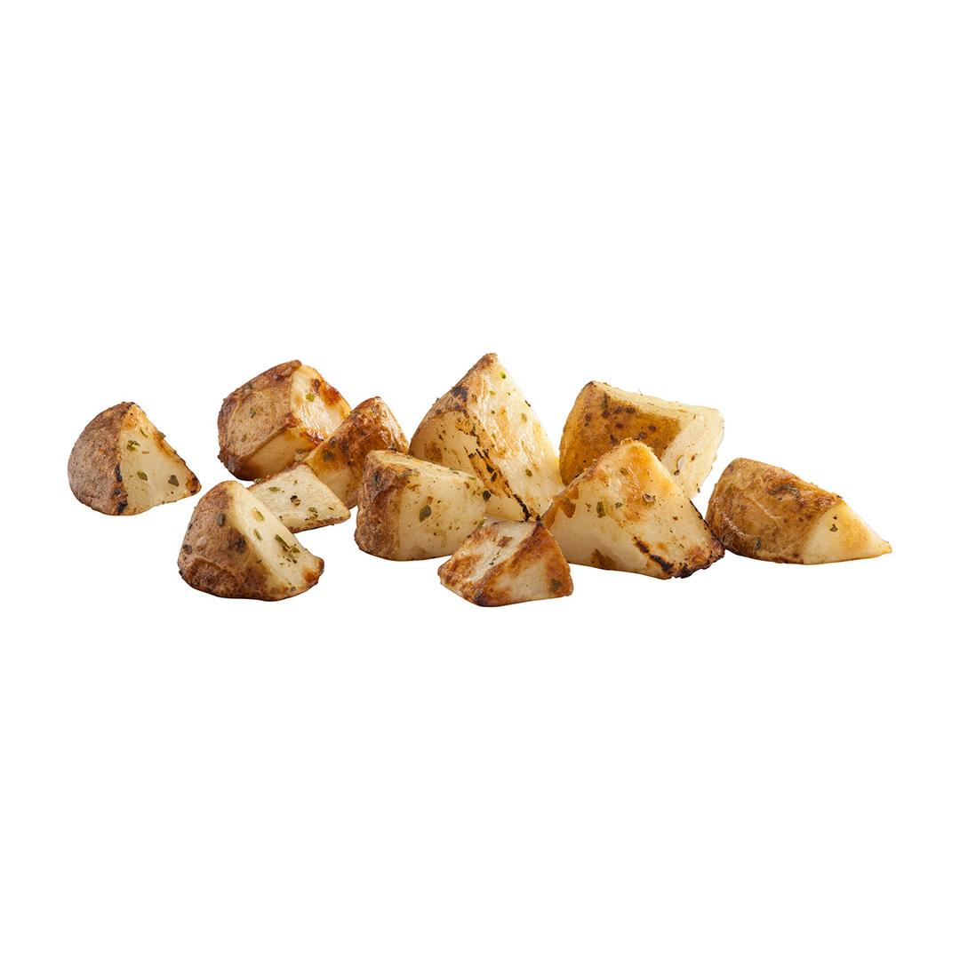 Papas de cáscara marrón con ajo y hierbas rostizadas